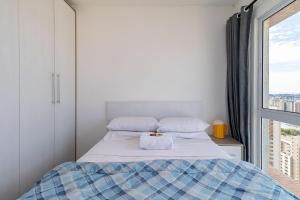 En eller flere senge i et værelse på Apartamento de 1 Quarto dos Simpsons - CEN2709