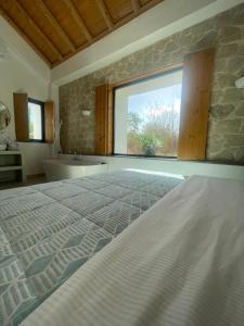 Postel nebo postele na pokoji v ubytování B&B Quinta a Fonte Tavira - Adults Only