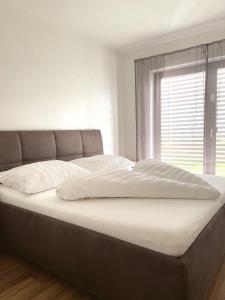 Postel nebo postele na pokoji v ubytování Ferienwohnung Kühar
