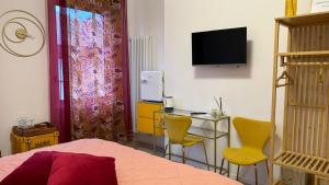 TV a/nebo společenská místnost v ubytování Comfort Accommodation Suite & Le Camere