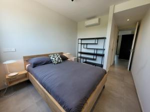 a bedroom with a large bed in a room at The Grand in Jan Thiel +32 photos