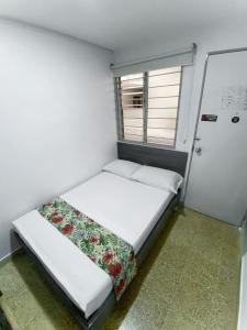 Katil atau katil-katil dalam bilik di Hotel Plaza Mayor Itagui