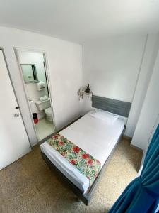 Katil atau katil-katil dalam bilik di Hotel Plaza Mayor Itagui