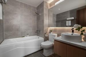 Et badeværelse på Keypad Hotel - Linh Lang