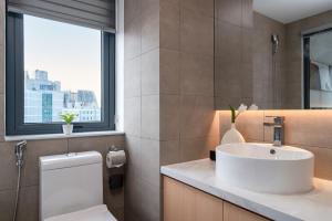 Et badeværelse på Keypad Hotel - Linh Lang