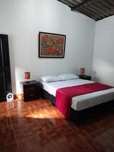 A bed or beds in a room at Cafilandia