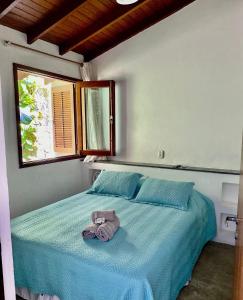 Casas do Mar客房内的一张或多张床位