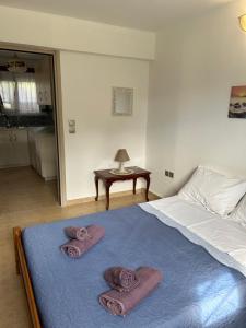 Posteľ alebo postele v izbe v ubytovaní Ada's House