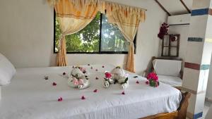 Ένα ή περισσότερα κρεβάτια σε δωμάτιο στο Flor's House +33 φωτογραφίες