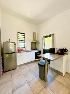 Kuchyň nebo kuchyňský kout v ubytování Tiny House Moorea Haylee + 3 fotografie