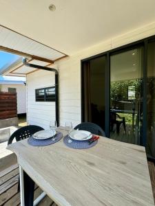 TV a/nebo společenská místnost v ubytování Tiny House Moorea Haylee