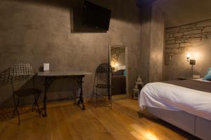 Postel nebo postele na pokoji v ubytování Les Chambres du Vivier, chambres d'hôtes et gîte - à 100m -