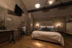 Postel nebo postele na pokoji v ubytování Les Chambres du Vivier, chambres d'hôtes et gîte - à 100m -