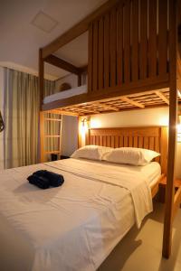 Postel nebo postele na pokoji v ubytování NaCasa Hostel