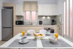 A kitchen or kitchenette at Casa Centrale ad Argostoli!