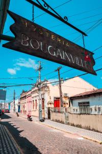a sign for a street in a town at Casa no coração de Areia in Areia