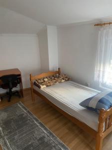 Postel nebo postele na pokoji v ubytování A&E Apartments