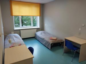 Postel nebo postele na pokoji v ubytování Tallinn Airport Stay