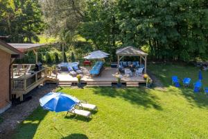 an aerial view of a backyard with a gazebo at Westlake waterfront, hot tub, dock,4 mins to beach in West Lake