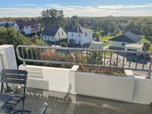 Balkón nebo terasa v ubytování Komfortables Apartment, Ihr Zuhause auf Zeit mit 3 Schlafzimmern, 2 Balkonen, Netflix & 24h Check-In