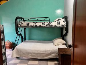 Postel nebo postele na pokoji v ubytování Casa Ortiz