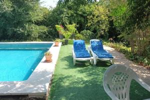 Bazén v ubytování Finca Marina Turismo Rural nebo v jeho okolí