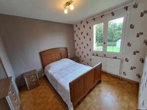 Postel nebo postele na pokoji v ubytování Gite de L'Espérance + 6 fotografií