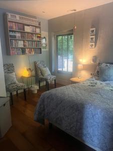Postelja oz. postelje v sobi nastanitve Stone Lodge B&B