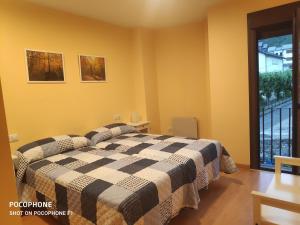 Ένα ή περισσότερα κρεβάτια σε δωμάτιο στο Apartamento Gabieto