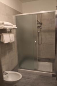 Koupelna v ubytování Ricci Rooms