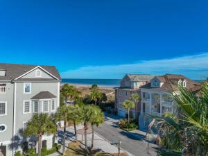 an aerial view of homes with palm trees and the ocean at Luxury 7BR w Ocean Views & Private Pool in Hilton Head Island