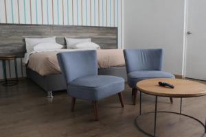Postel nebo postele na pokoji v ubytování Basadre Apart Hotel