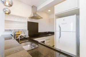 Kuchyň nebo kuchyňský kout v ubytování Viva nas Alturas 2 Quartos com Vaga - UNI2707