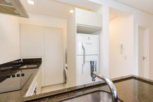 Η κουζίνα ή μικρή κουζίνα στο Viva nas Alturas 2 Quartos com Vaga - UNI2707