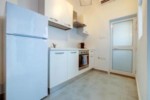 Η κουζίνα ή μικρή κουζίνα στο Charming Studio close to the Promenade