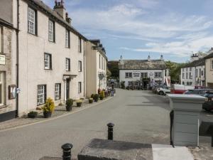 a street in a small town with buildings at Edgemere Cottage in Grange Over Sands