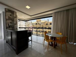 Posezení v ubytování Apartamento para aluguel de temporada Bombas