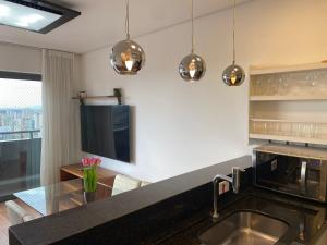 Η κουζίνα ή μικρή κουζίνα στο Viva nas Alturas 2 Quartos com Vaga - UNI2707