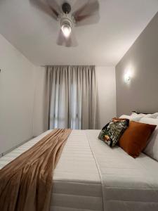 Ένα ή περισσότερα κρεβάτια σε δωμάτιο στο PALM BEACH HOUSE - Paraty
