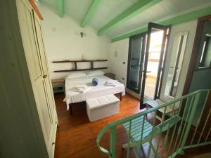 Postel nebo postele na pokoji v ubytování Facussa house