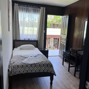 Postelja oz. postelje v sobi nastanitve Hotel Naralit