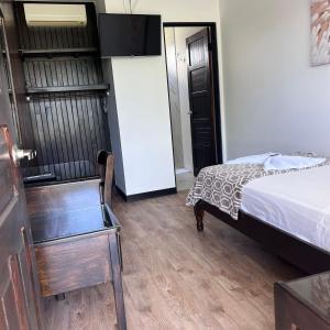 Postelja oz. postelje v sobi nastanitve Hotel Naralit