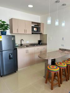 Kuchyň nebo kuchyňský kout v ubytování Cartagena Aparta Suite con Vista al Mar