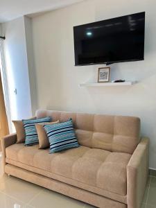 TV a/nebo společenská místnost v ubytování Cartagena Aparta Suite con Vista al Mar