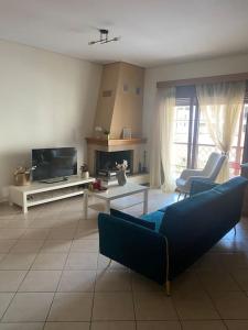 Μια τηλεόραση ή/και κέντρο ψυχαγωγίας στο Central Nest Apartment