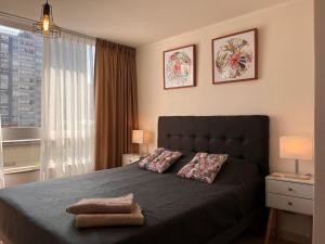 Postel nebo postele na pokoji v ubytování Living Rosas