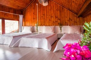 Katil atau katil-katil dalam bilik di Pousada Paraíso dos Anjos +38 gambar