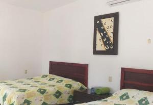 Postel nebo postele na pokoji v ubytování Hotel Mariam + 30 fotografií