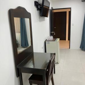 TV in/ali zabaviščno središče v nastanitvi Hotel Naralit