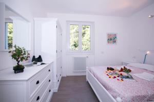 Posteľ alebo postele v izbe v ubytovaní Casa Laura Apt. 6